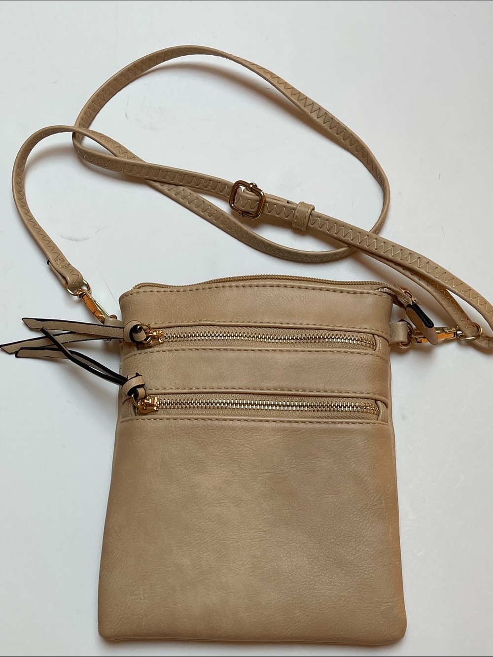 Faux leather flat cell phone crossbody bag with lots of zippers - NWOT